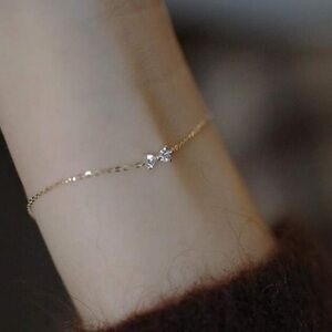 Dainty Gold Bracelet with Sparkling Accents and Star Charm